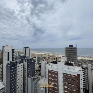 Apartamento com 77m², 2 dormitórios, 1 suíte, 2 vagas no Maui Residencial em Torres para Comprar