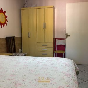 Casa com 180m², 5 dormitórios, 1 suíte, 2 vagas no bairro Praia da Cal em Torres para Comprar