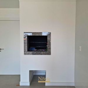 Apartamento com 74m², 2 dormitórios, 1 suíte, 1 vaga no Residencial Acrópole em Torres para Comprar