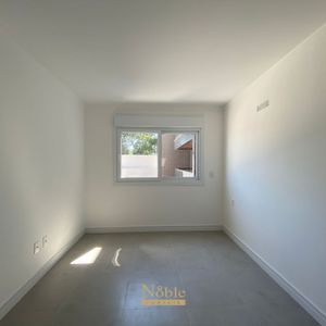 Apartamento com 84m², 2 dormitórios, 1 suíte, 1 vaga no Residencial Acrópole em Torres para Comprar