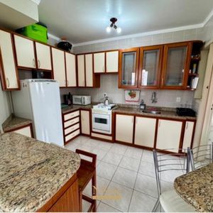 Apartamento com 65m², 2 dormitórios, 1 vaga no Edifício Porto Seguro em Torres para Comprar