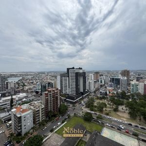 Apartamento com 108m², 3 dormitórios, 1 suíte, 2 vagas no Maui Residencial em Torres para Comprar