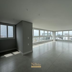 Apartamento com 108m², 3 dormitórios, 1 suíte, 2 vagas no Maui Residencial em Torres para Comprar