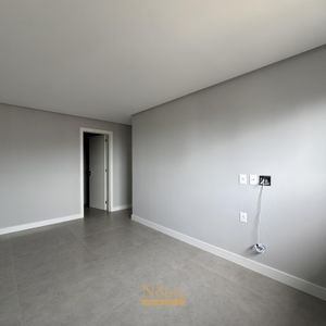 Apartamento com 108m², 3 dormitórios, 1 suíte, 2 vagas no Maui Residencial em Torres para Comprar