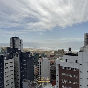 Apartamento com 90m², 2 dormitórios, 2 suítes, 2 vagas no Maui Residencial em Torres para Comprar