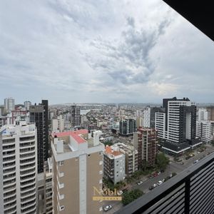 Apartamento com 77m², 2 dormitórios, 1 suíte, 2 vagas no Maui Residencial em Torres para Comprar