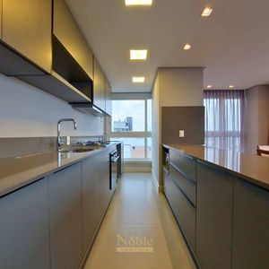 Apartamento com 102m², 3 dormitórios, 1 suíte, 2 vagas no Maui Residencial em Torres para Comprar