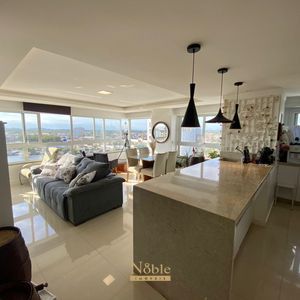 Apartamento com 100m², 3 dormitórios, 1 suíte, 2 vagas no Torre de Athena em Torres para Comprar
