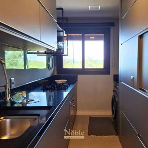 Apartamento com 106m², 3 dormitórios, 1 suíte, 2 vagas no Essenza em Torres para Comprar