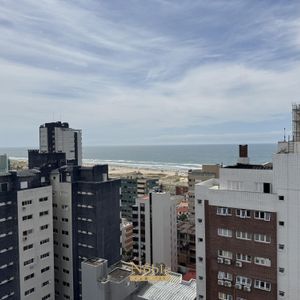 Apartamento com 90m², 2 dormitórios, 2 suítes, 2 vagas no Maui Residencial em Torres para Comprar