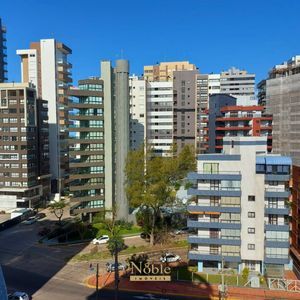 Apartamento com 131m², 3 dormitórios, 1 suíte, 2 vagas no Torre do Sol em Torres para Comprar