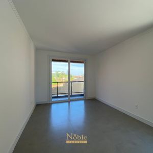 Apartamento com 84m², 2 dormitórios, 1 suíte, 1 vaga no Residencial Acrópole em Torres para Comprar