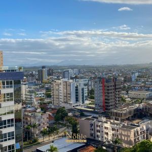 Apartamento com 120m², 4 dormitórios, 1 suíte, 2 vagas no Michelângelo em Torres para Comprar