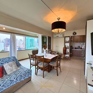 Apartamento com 91m², 2 dormitórios, 1 suíte, 1 vaga no Ed. Fenix Center em Torres para Comprar