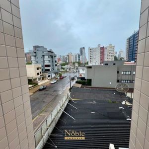Apartamento com 65m², 2 dormitórios, 1 vaga no Edifício Porto Seguro em Torres para Comprar