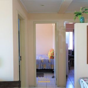 Apartamento com 53m², 2 dormitórios, 1 vaga no Condomínio Justo em Torres para Comprar