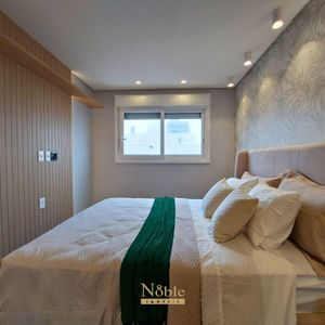 Apartamento com 90m², 2 dormitórios, 2 suítes, 2 vagas no Maui Residencial em Torres para Comprar