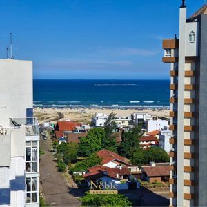 Apartamento com 98m², 3 dormitórios, 1 suíte, 3 vagas no Metropolitan em Torres para Comprar