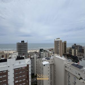 Apartamento com 77m², 2 dormitórios, 1 suíte, 2 vagas no Maui Residencial em Torres para Comprar