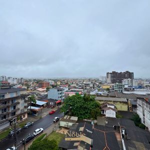 Apartamento com 91m², 2 dormitórios, 1 suíte, 1 vaga no Ed. Fenix Center em Torres para Comprar