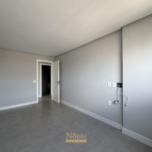 Apartamento com 102m², 3 dormitórios, 1 suíte, 2 vagas no Maui Residencial em Torres para Comprar