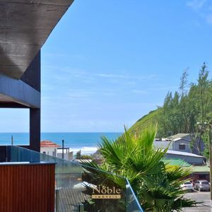 Apartamento com 106m², 3 dormitórios, 1 suíte, 2 vagas no Essenza em Torres para Comprar