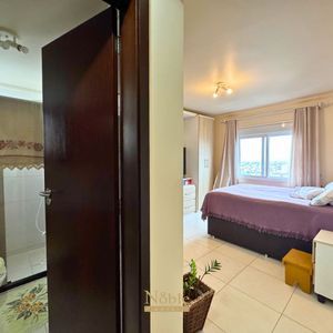 Apartamento com 91m², 2 dormitórios, 1 suíte, 1 vaga no Ed. Fenix Center em Torres para Comprar