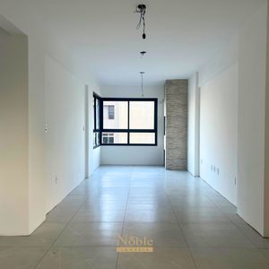 Apartamento com 72m², 2 dormitórios, 1 suíte, 1 vaga no Towers Trade Center em Torres para Comprar