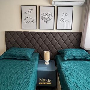 Apartamento com 78m², 2 dormitórios, 1 suíte, 2 vagas no Residencial DI Capri em Torres para Comprar