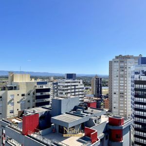 Apartamento, 2 dormitórios, 2 suítes, 2 vagas no Absoluto em Torres para Comprar