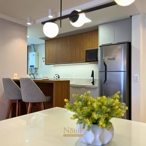 Apartamento com 71m², 2 dormitórios, 1 suíte, 2 vagas no Residencial DI Capri em Torres para Comprar