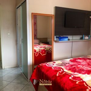 Casa com 180m², 5 dormitórios, 1 suíte, 2 vagas no bairro Praia da Cal em Torres para Comprar