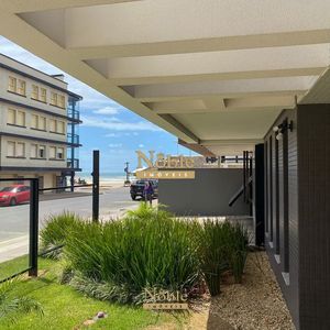 Apartamento com 71m², 2 dormitórios, 1 suíte, 2 vagas no Residencial DI Capri em Torres para Comprar
