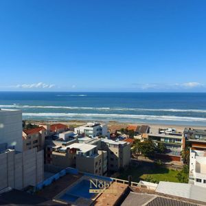 Apartamento com 120m², 3 dormitórios, 2 suítes, 2 vagas no La Vistara em Torres para Comprar