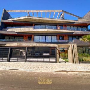 Apartamento com 99m², 3 dormitórios, 1 suíte, 2 vagas no Essenza em Torres para Comprar