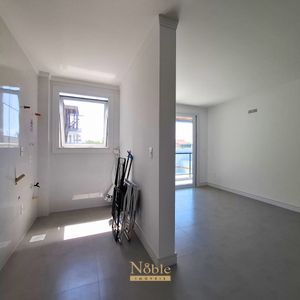 Apartamento com 74m², 2 dormitórios, 1 suíte, 1 vaga no Residencial Acrópole em Torres para Comprar