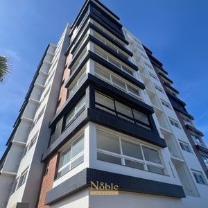 Apartamento com 70m², 2 dormitórios, 1 suíte, 1 vaga no Topazio em Torres para Comprar
