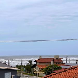 Apartamento com 69m², 2 dormitórios, 1 suíte, 1 vaga no Residencial Acrópole em Torres para Comprar