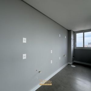 Apartamento com 77m², 2 dormitórios, 1 suíte, 2 vagas no Maui Residencial em Torres para Comprar