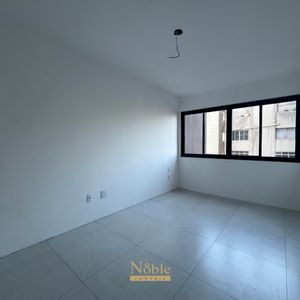 Apartamento com 72m², 2 dormitórios, 1 suíte, 1 vaga no Towers Trade Center em Torres para Comprar