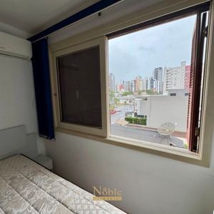 Apartamento com 65m², 2 dormitórios, 1 vaga no Edifício Porto Seguro em Torres para Comprar