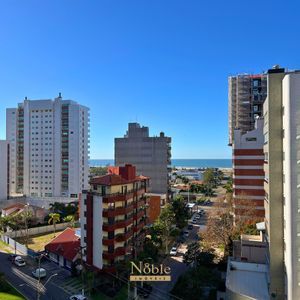 Apartamento com 88m², 3 dormitórios, 1 suíte, 2 vagas no Perito Moreno em Torres para Comprar