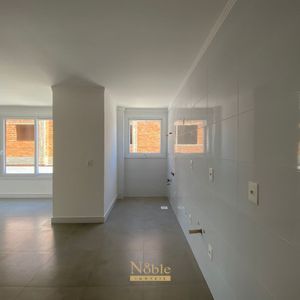 Apartamento com 84m², 2 dormitórios, 1 suíte, 1 vaga no Residencial Acrópole em Torres para Comprar