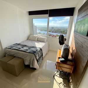 Apartamento com 100m², 3 dormitórios, 1 suíte, 2 vagas no Torre de Athena em Torres para Comprar