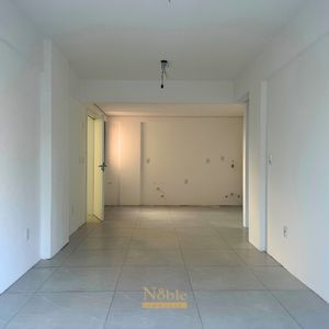 Apartamento com 72m², 2 dormitórios, 1 suíte, 1 vaga no Towers Trade Center em Torres para Comprar
