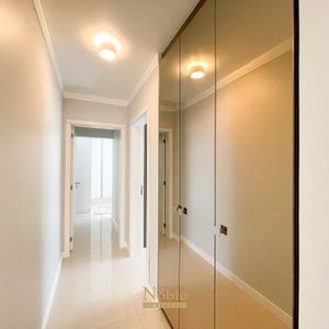 Apartamento com 124m², 3 dormitórios, 3 suítes, 2 vagas no Lê Classic em Torres para Comprar