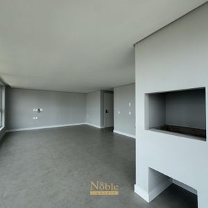 Apartamento com 102m², 3 dormitórios, 1 suíte, 2 vagas no Maui Residencial em Torres para Comprar