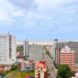 Apartamento com 107m², 2 dormitórios, 2 suítes, 2 vagas no Ibiza em Torres para Comprar