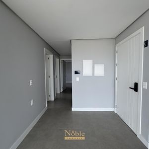 Apartamento com 108m², 3 dormitórios, 1 suíte, 2 vagas no Maui Residencial em Torres para Comprar