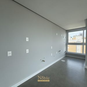 Apartamento com 102m², 3 dormitórios, 1 suíte, 2 vagas no Maui Residencial em Torres para Comprar